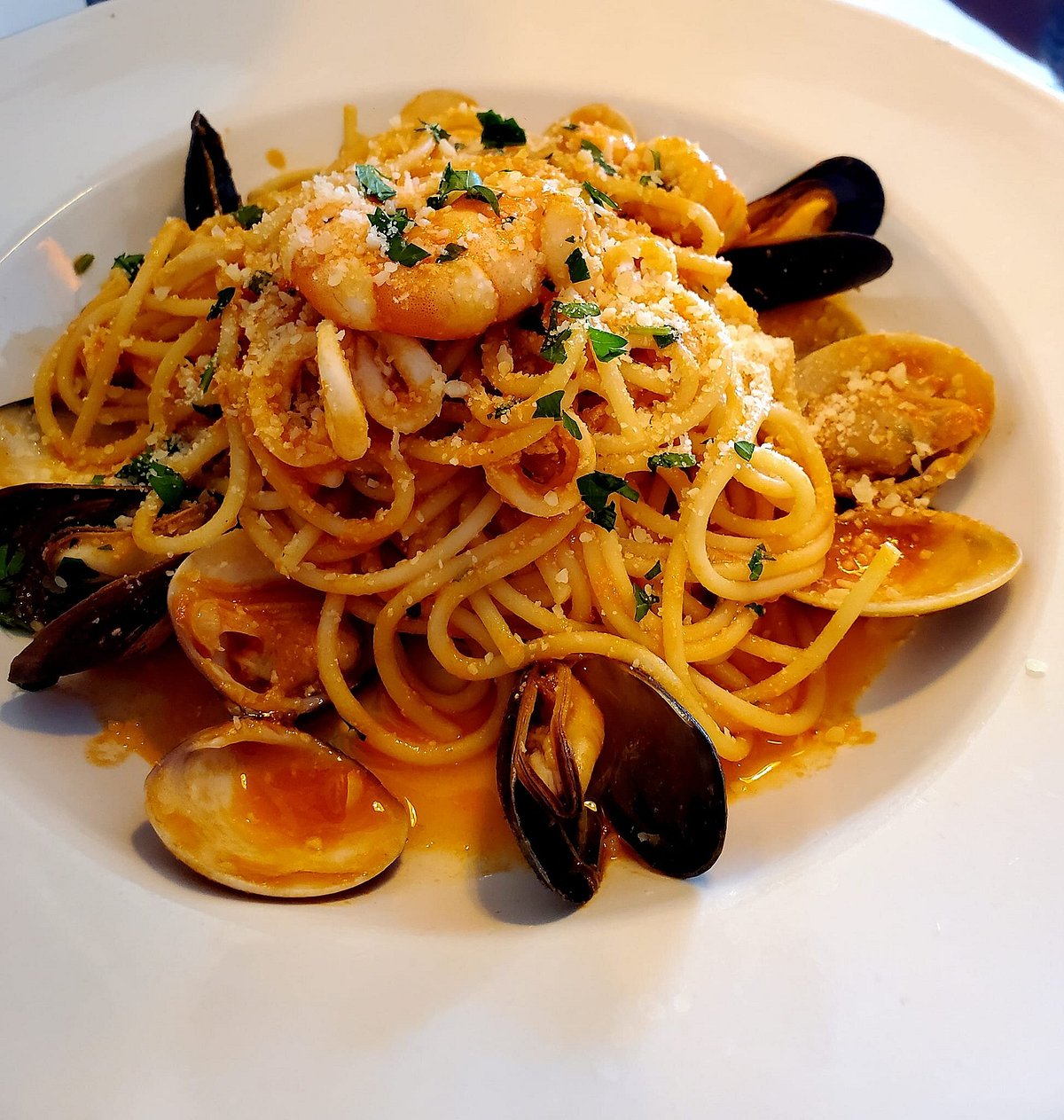 Al dente Trattoria signature dishes Veal PiccataSpaghetti with ClamsGnocchi with Gorgonzola SauceCalamari Fritti